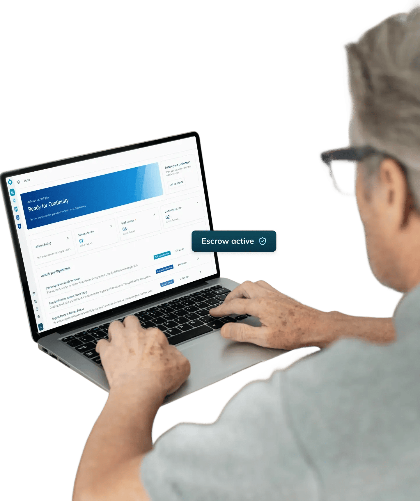 Man using a laptop with the “Ready for continuity” screen displayed.