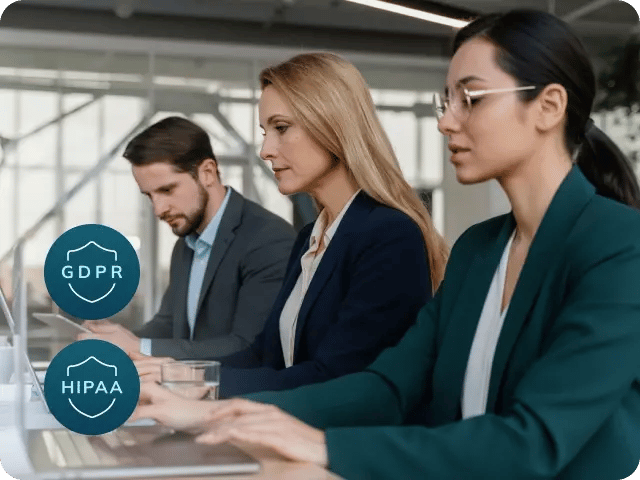 Three professionals working in an office with a UI snippet on the left side displaying GDPR and HIPAA compliance solution badges.