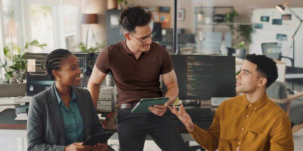 Colleagues explaining the importance of cyber security to one another