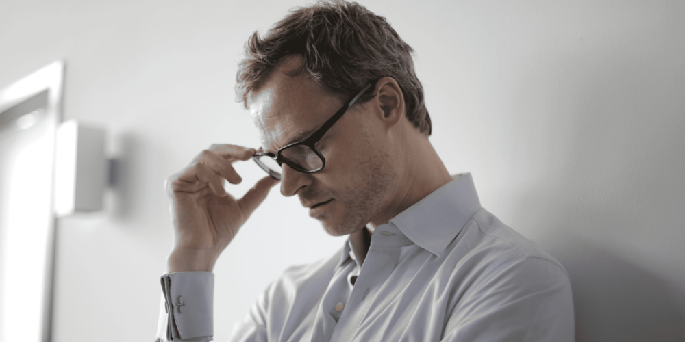 Worried tech business owner facing insolvency in Australia.